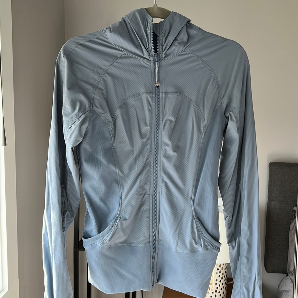 Lululemon Women’s reversible track jacket, light blue.